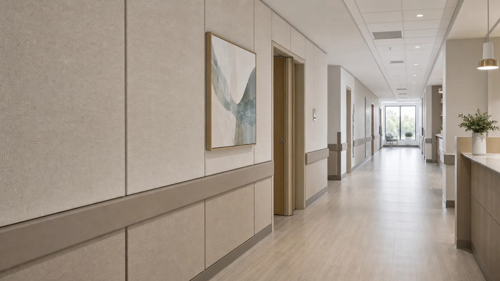 Healthcare corridor with taupe fabric acoustic wall panels