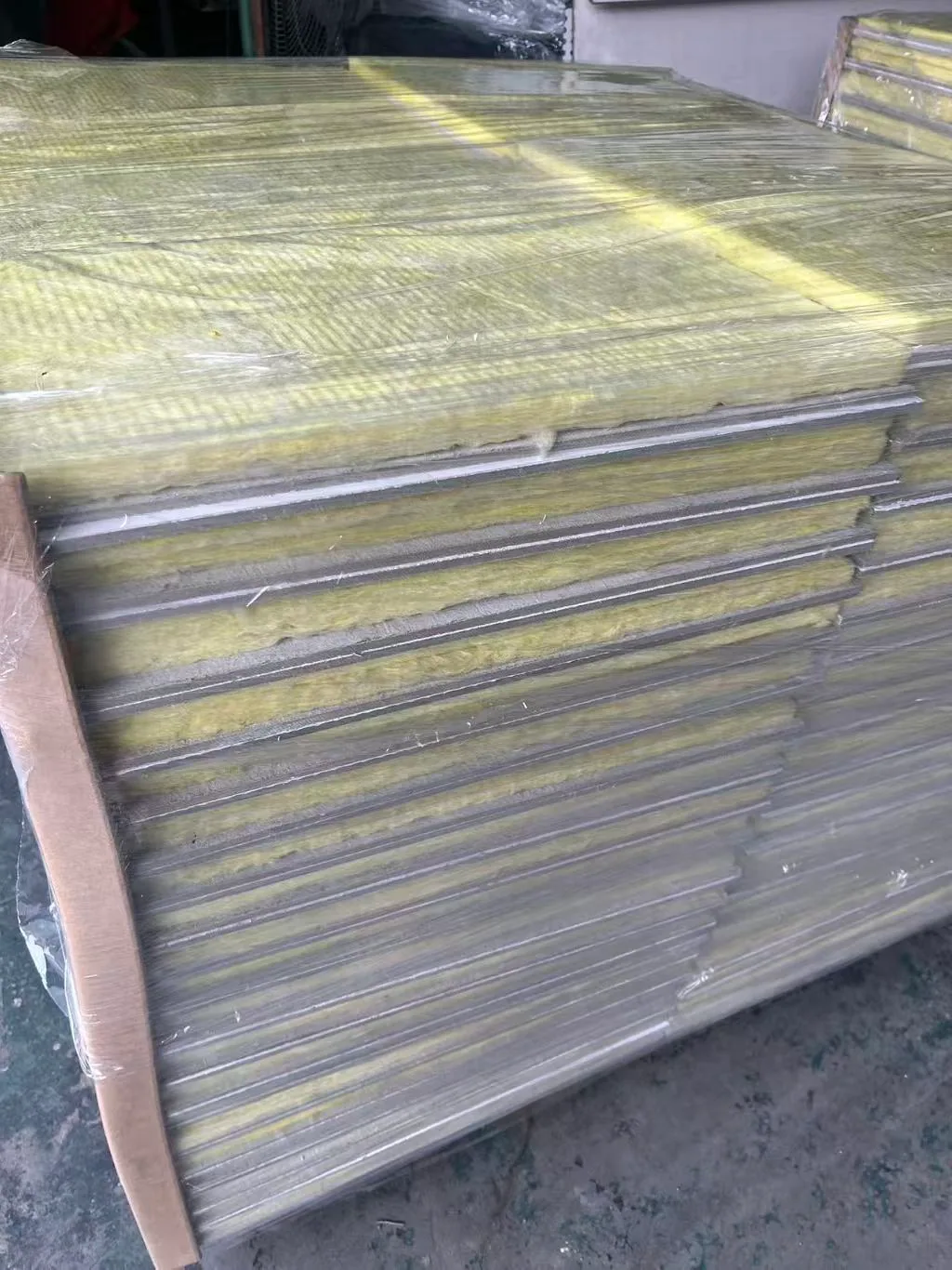 Wrapped mineral wool panel packs in the factory